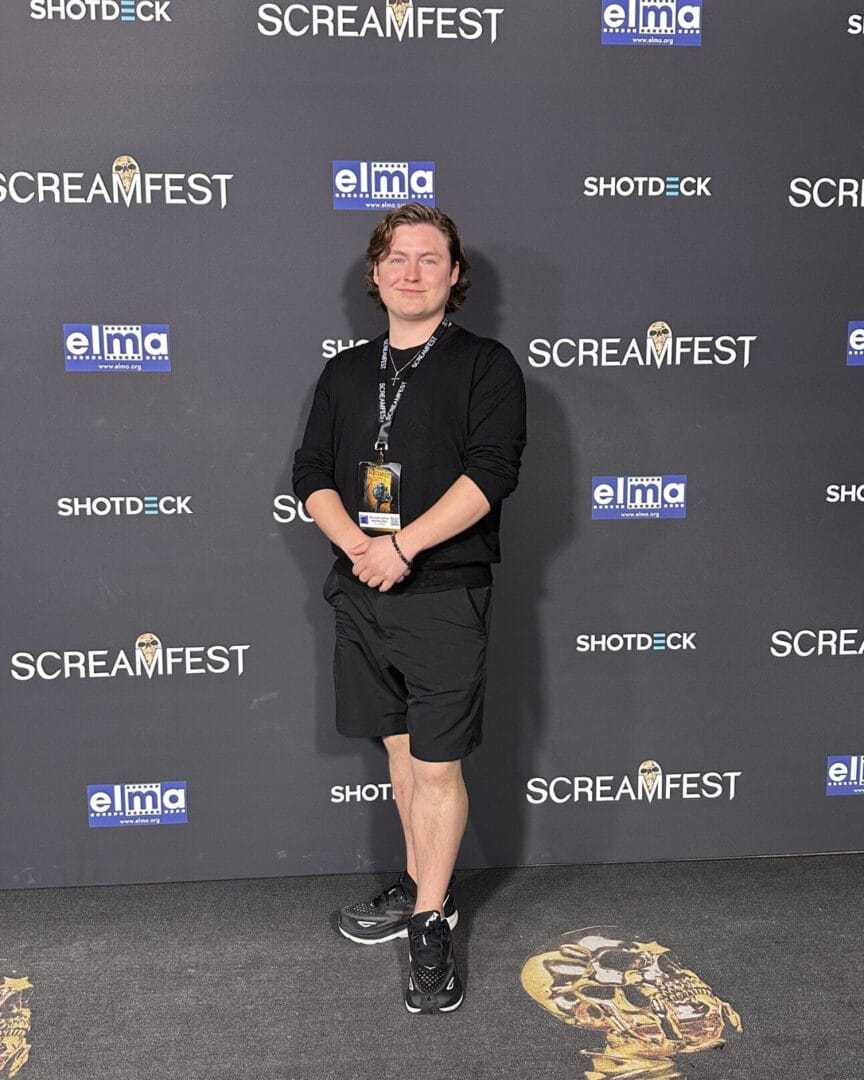 College for Arts and Technology Professional Filmmaking Graduate Michael Marentette poses at a Film Gala Event. 