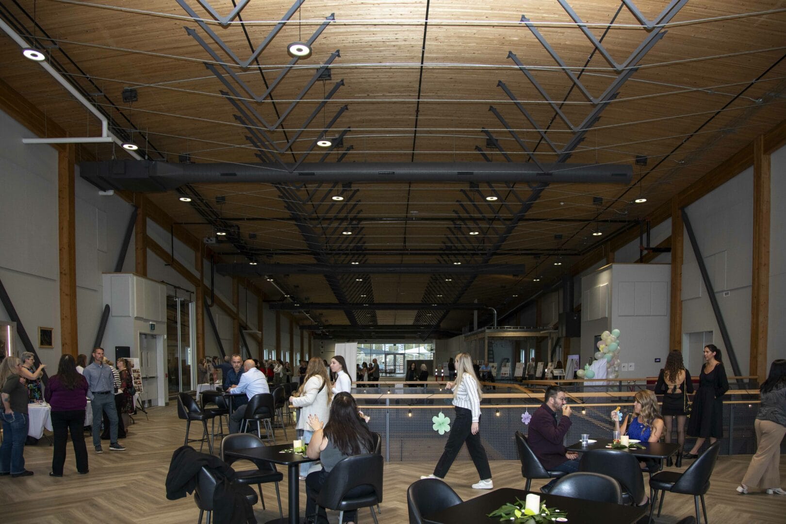 Interior of the venue, KF College for Excellence showing some guests enjoying the space.  